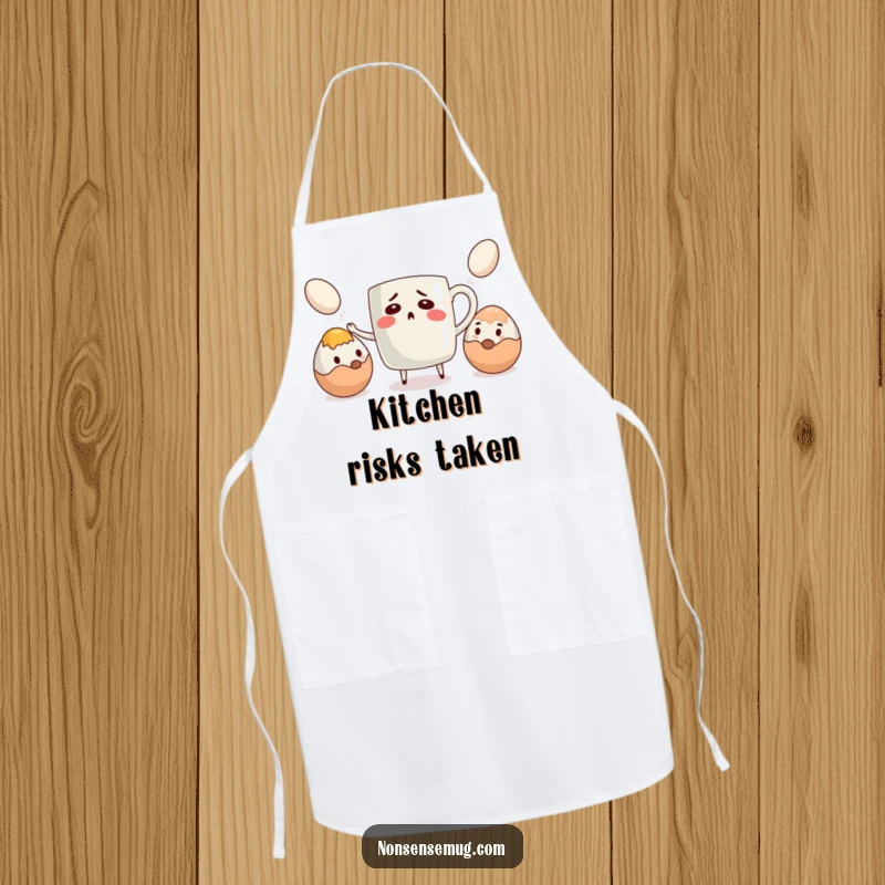 Funny apron with a bewildered coffee mug attempting to juggle eggs, ideal for adding humor to cooking and baking.