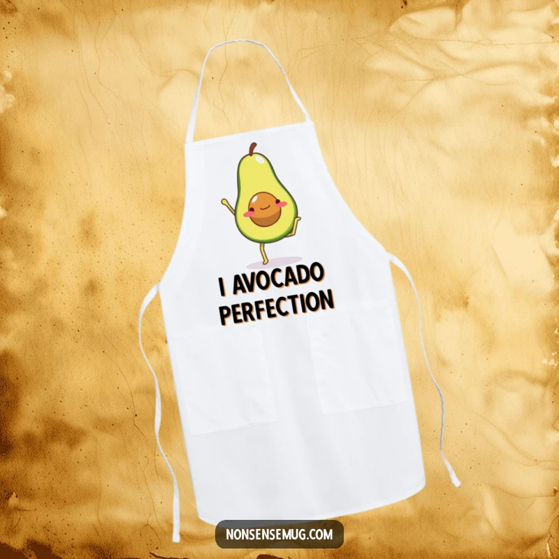 Funny apron illustrating an avocado character with legs attempting a handstand in the kitchen, encouraging healthy cooking.