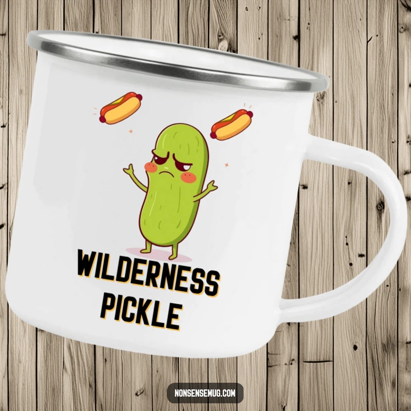 Funny camping mug featuring a grumpy pickle looking confused while juggling three flying hot dogs, for outdoor humor.