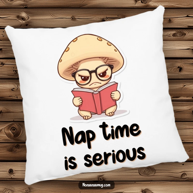 Funny pillow with a grumpy mushroom wearing glasses, reading a tiny book, offering comfort and a dose of scholarly humor.