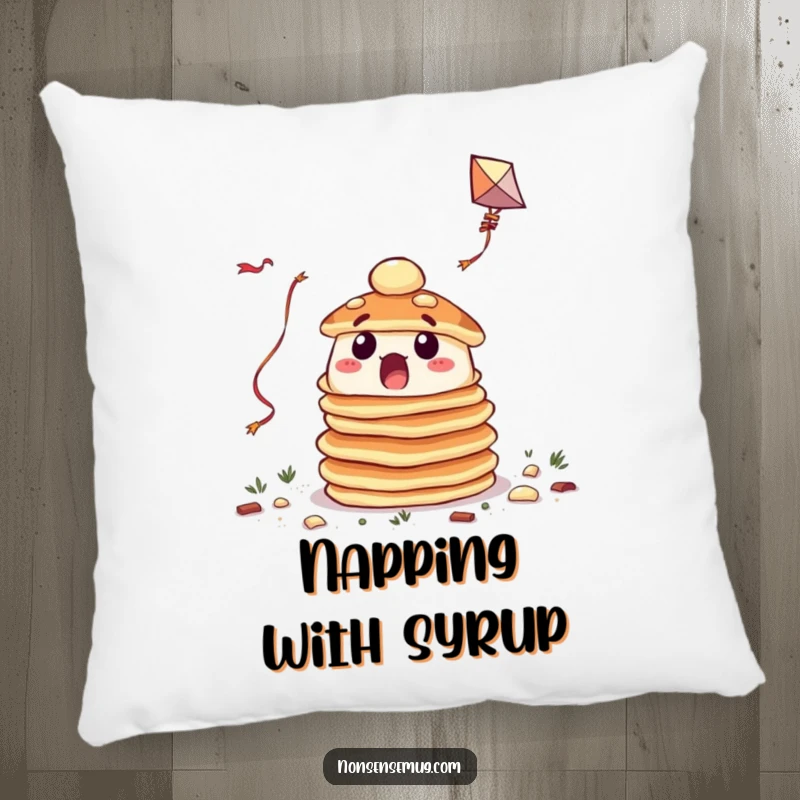 Funny pillow featuring a surprised pile of pancakes attempting to fly a kite, adding breakfast whimsy.