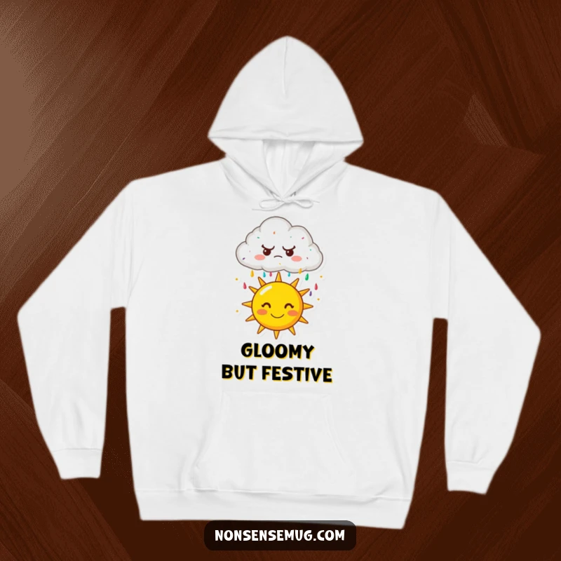 Funny hoodie: A grumpy, frowning cloud showering a cheerfully smiling sun with colorful sprinkles. Soft, warm, and humorous.