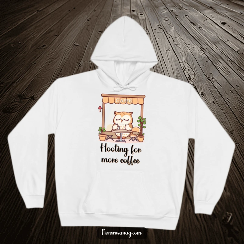 Funny Hoodie featuring a sleepy owl dining at a tiny cafe, perfect for staying warm and embracing a relaxed mood.