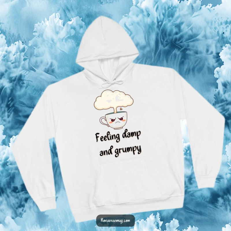 Funny hoodie showing a disgruntled teacup enduring a downpour from a cloud, perfect for those who enjoy a touch of gloomy humor.