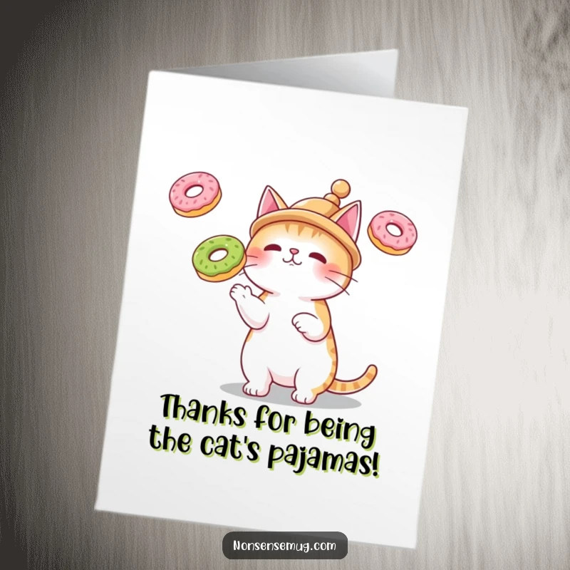 Funny Free Printable Thank You Card: A cat wearing a tiny hat juggles donuts, conveying thanks.