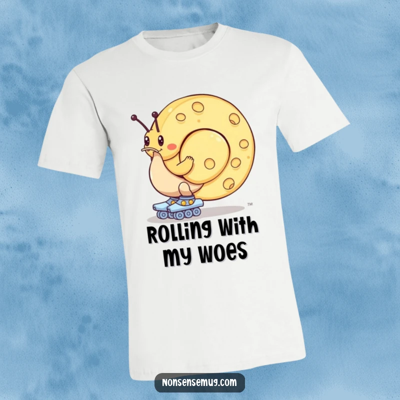 Funny t-shirt: A snail wearing roller skates strains mightily to push a giant wheel of cheese, embodying slow and steady effort.