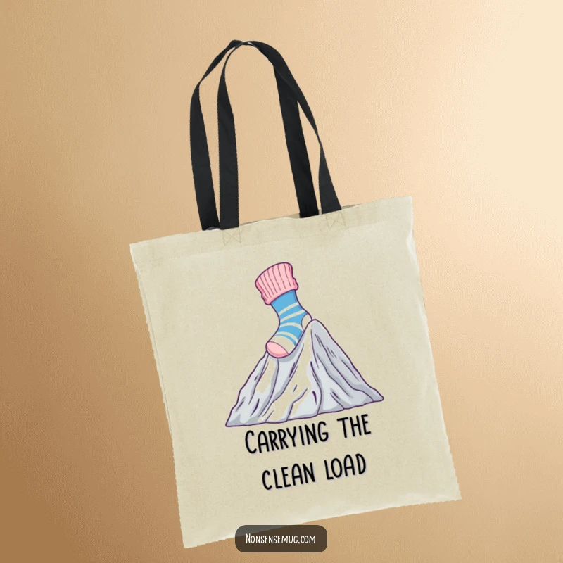 Funny Tote Bag showcasing a brave sock climbing Mount Laundry, ideal for carrying items with a dose of humorous courage.