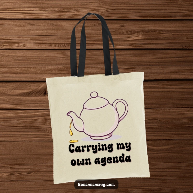 Funny illustration of a teapot pouring tea into its own spout, printed on a stylish tote bag.