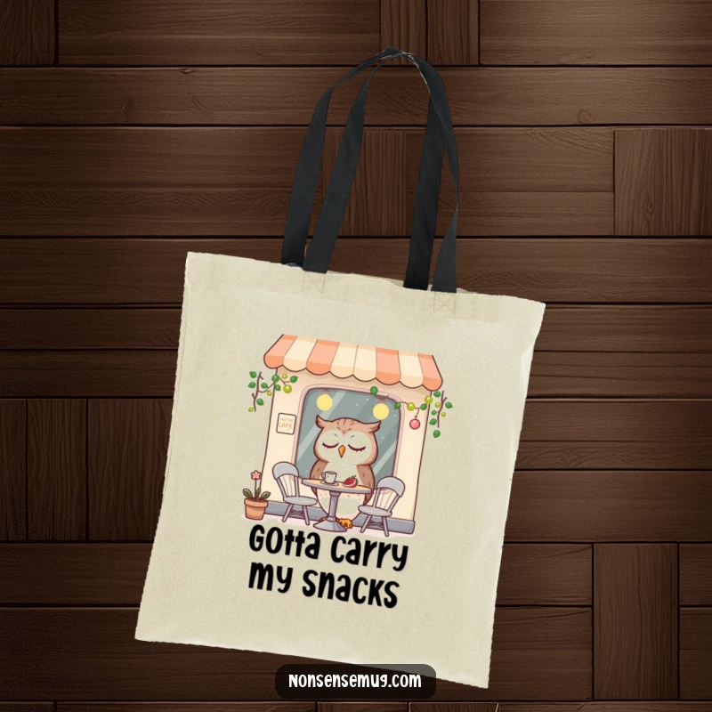 Funny tote bag depicting a tired owl character dining in a small, charming cafe, ideal for carrying groceries or books.
